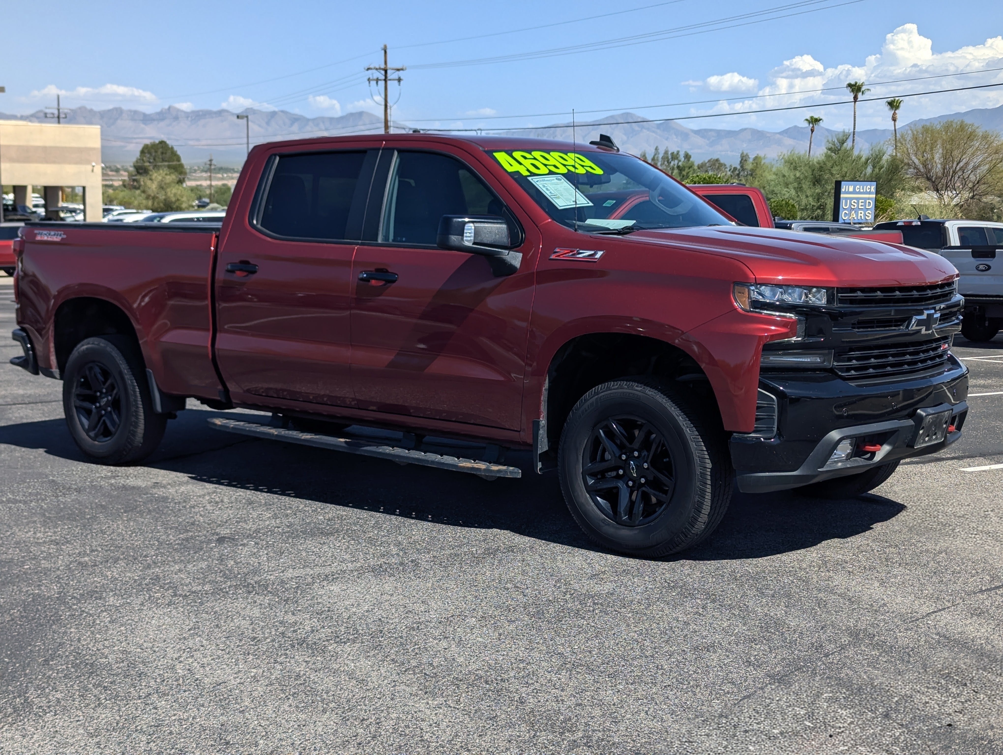 2021 Chevrolet Silverado 1500 LT Trail Boss in Cherry Red Tintcoat — front three-quarter view