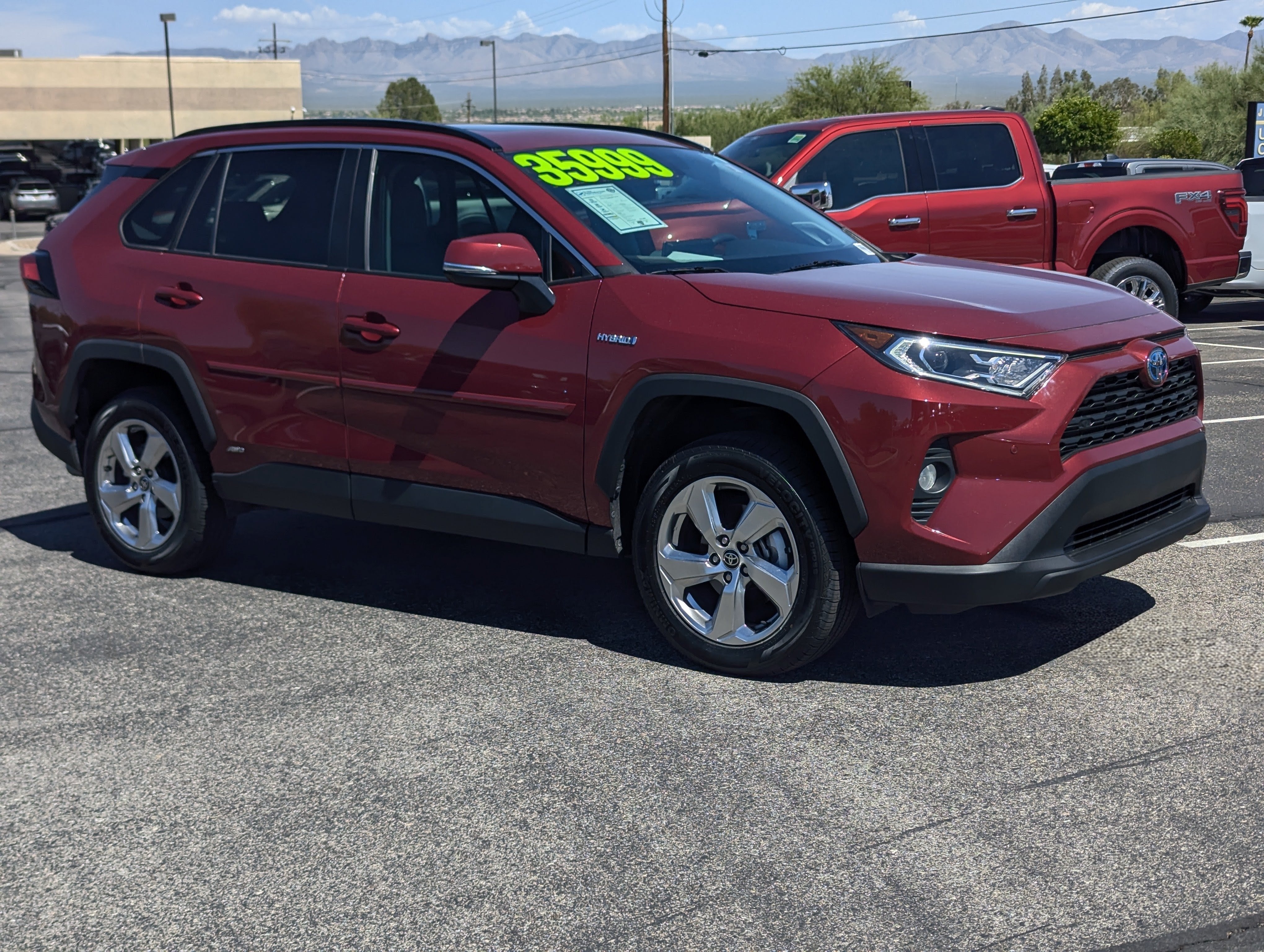 2021 Toyota RAV4 XLE in Red — front three-quarter view