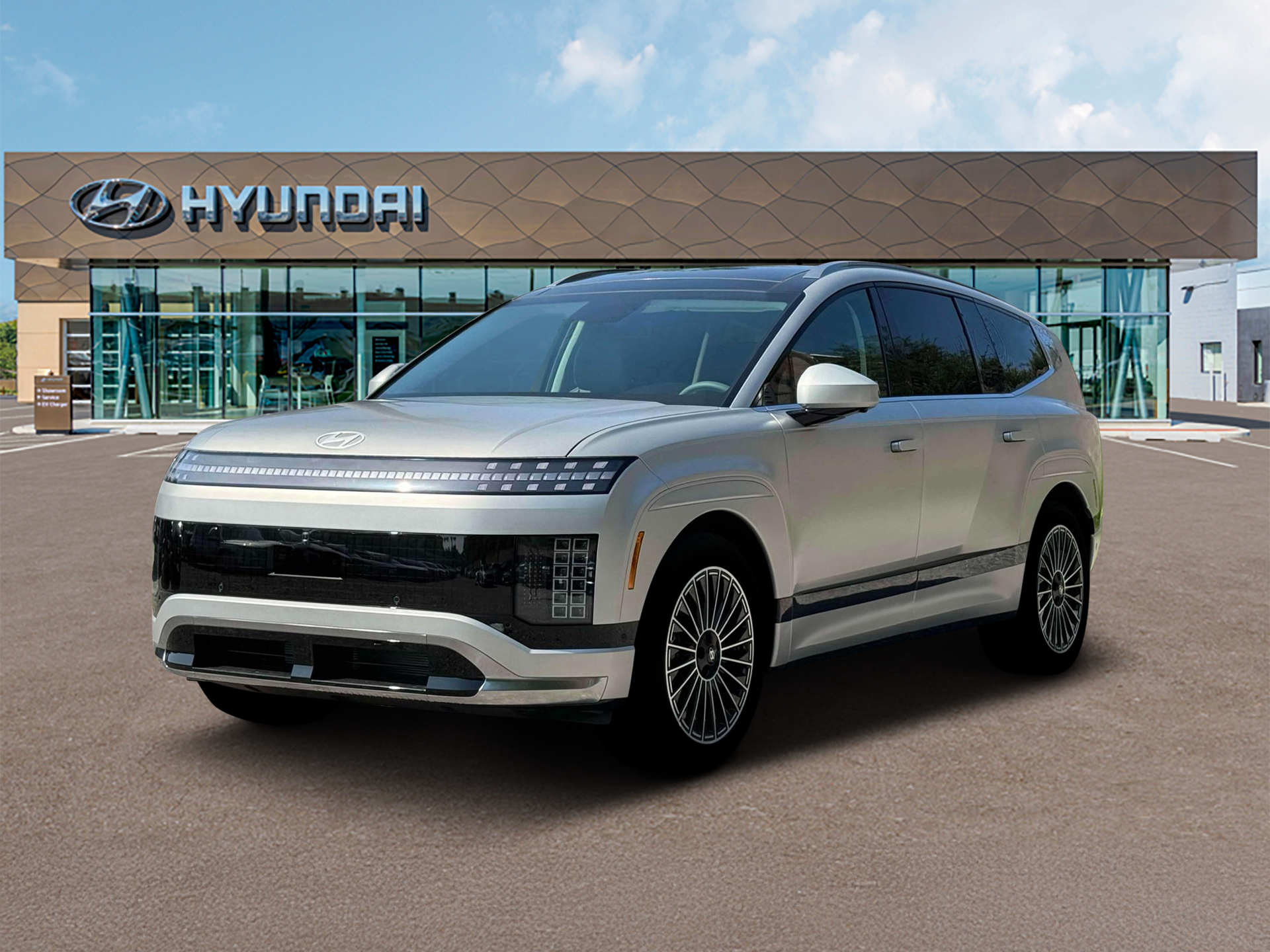 2026 Hyundai IONIQ 9 Performance Calligraphy Design in Gravity Gold Matte — front three-quarter view